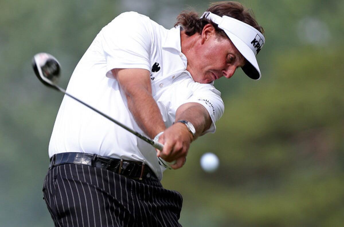 Phil Mickelson hits his tee shot at No. 2 during the second round of the U.S. Open on Friday at Merion Golf Club.
