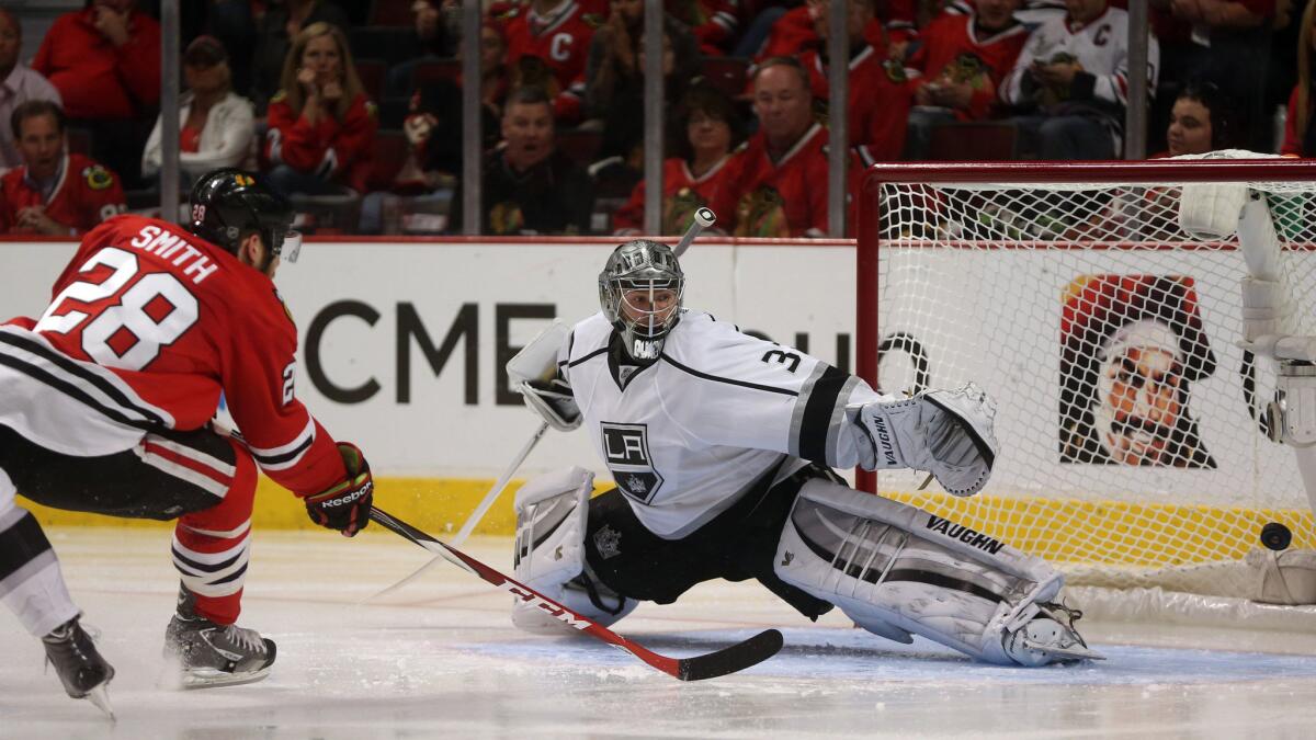 Chicago Blackhawks forward Ben Smith scores on Jonathan Quick during the third period of the Kings' 5-4 double-overtime loss in Game 5 of the Western Conference finals Wednesday.