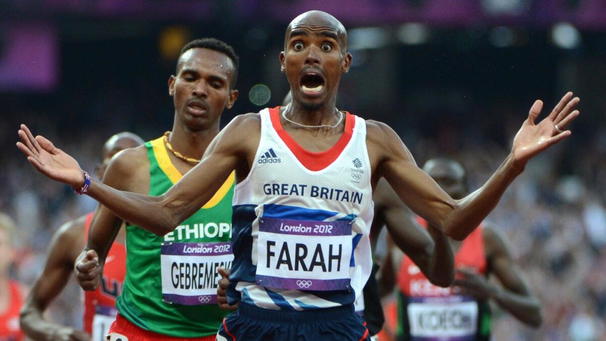 Britain's Mo Farah celebrates after winning gold in the men's 5,000 meters at the 2012 Olympic Games in London.