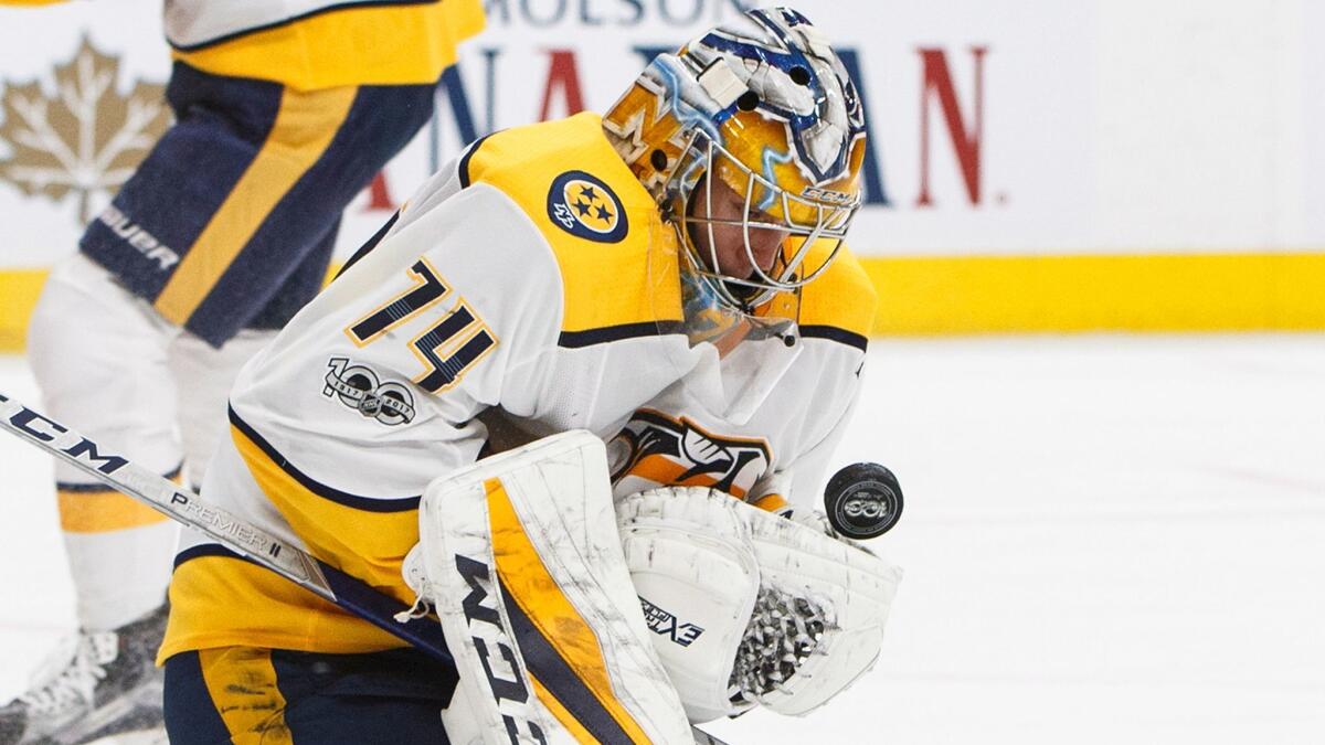 Nashville Predators goalie Juuse Saros makes one of his 46 saves against Edmonton.