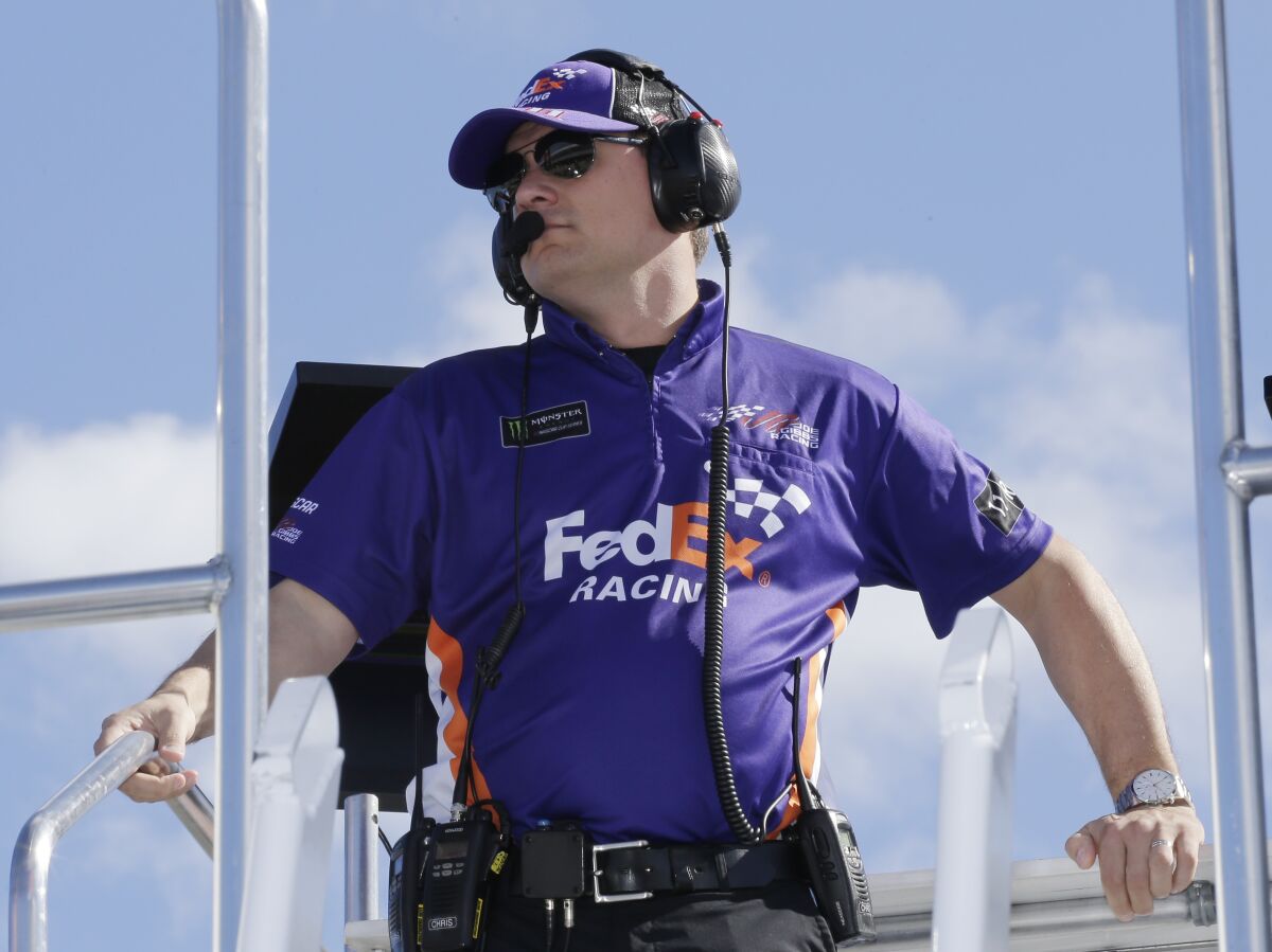 FILE - In this Nov. 16, 2019, file photo, crew chief Christopher Gabehart watches practice for a NASCAR Cup Series auto race at Homestead-Miami Speedway in Homestead, Fla. The pressure will be intense for crew chiefs in NASCAR's championship race. There is no practice or qualifying under COVID-19 protocols, so the team leaders must be on top of their game. (AP Photo/Terry Renna, File)