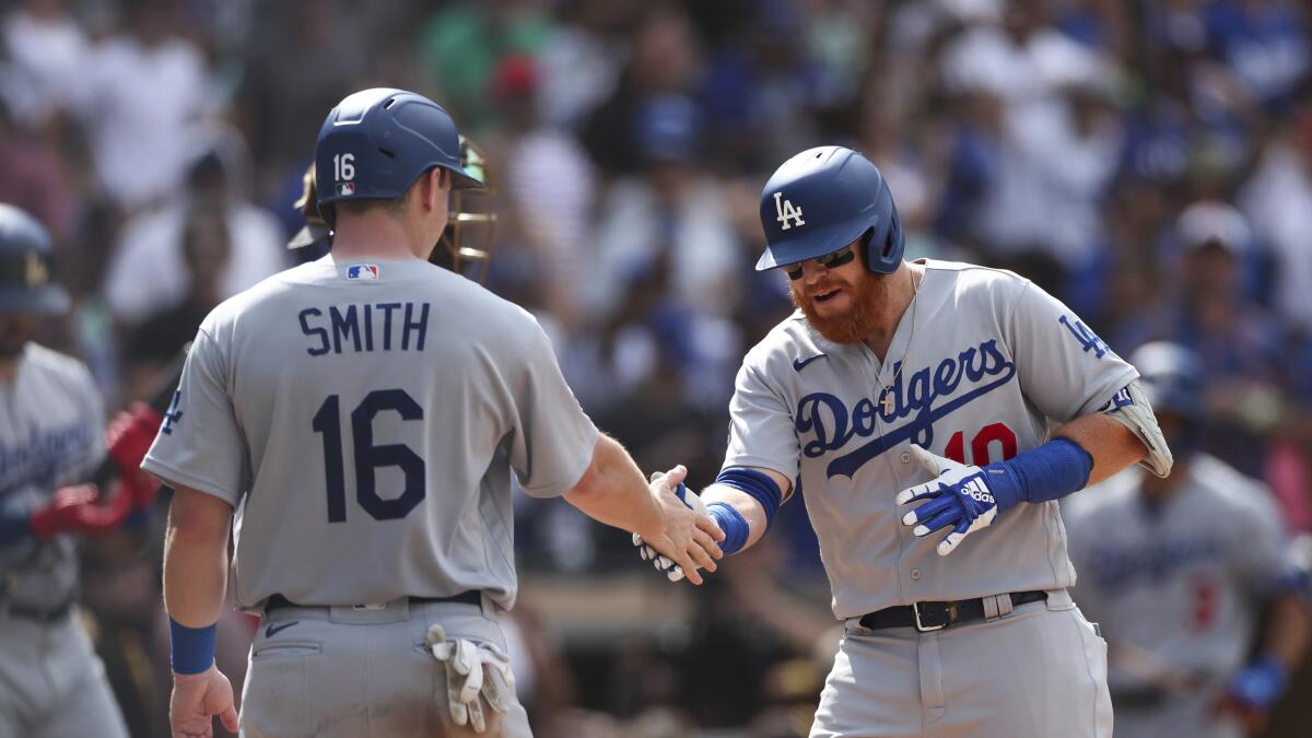 Los Angeles Dodgers' Justin Turner (21) stands at first base