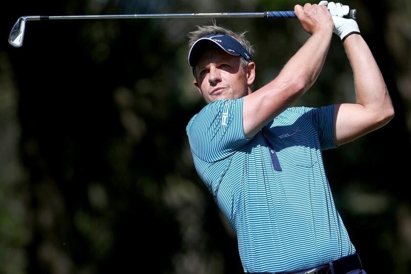 Luke Donald hits his tee shot Saturday at No. 13 during the third round of the RBC Heritage.