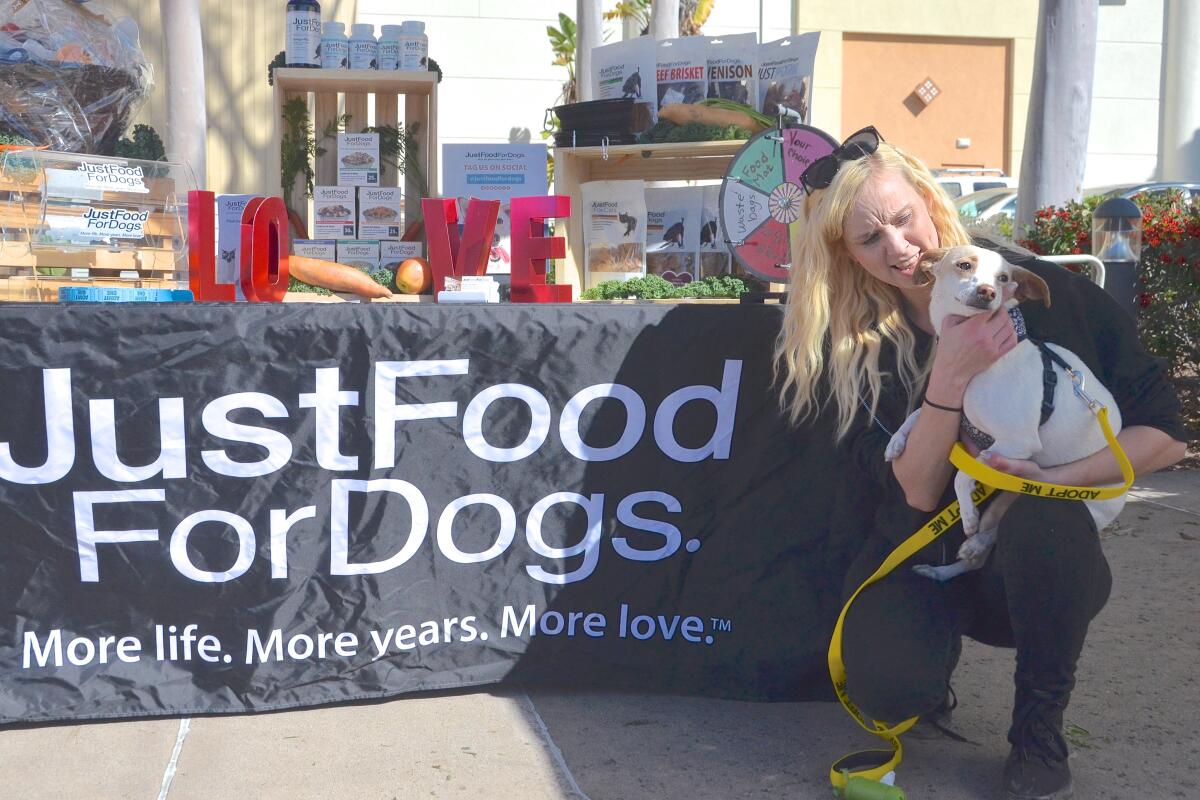 Food For Dogs nutritional consultant Rebekah Liptai poses with Azalea.