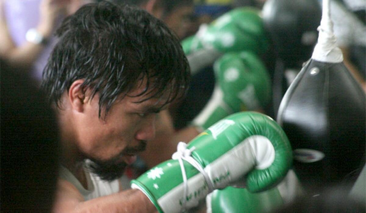 Manny Pacquiao, 34, trains at a gym on Oct. 24 ahead of his bout with Brandon Rios, 27, on Saturday in Macao.