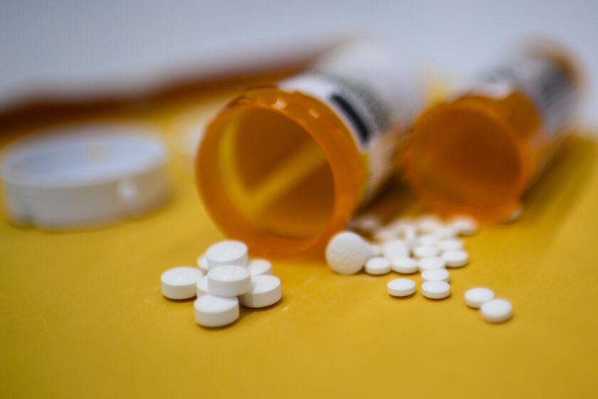This illustration image shows tablets of opioid painkiller Oxycodon delivered on medical prescription taken on September 18, 2019 in Washington,DC. - Millions of Americans sank into addiction after using potent opioid painkillers that the companies churned out and doctors freely prescribed over the past two decades. Well over 400,000 people died of opioid overdoses in that period, while the companies involved raked in billions of dollars in profits. And while the flood of prescription opioids into the black market has now been curtailed, addicts are turning to heroin and highly potent fentanyl to compensate, where the risk of overdose and death is even higher. (Photo by Eric BARADAT / AFP) (Photo by ERIC BARADAT/AFP via Getty Images)