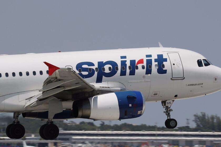 FORT LAUDERDALE, FL - MAY 09: A Spirit Airlines plane lands at the Fort Lauderdale-Hollywood International Airport on May 9, 2017 in Fort Lauderdale, Florida. Yesterday a chaotic scene erupted at the Spirit Airlines counter after flights were canceled which led to passengers getting irate and the police had to move in to restore order. Spirit blamed the delays on its pilots, who are negotiating for a new contract. (Photo by Joe Raedle/Getty Images) ** OUTS - ELSENT, FPG, CM - OUTS * NM, PH, VA if sourced by CT, LA or MoD **
