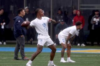 LOS ANGELES, CALIF. - MAR. 15, 2023. Former UCLA football quarterback Dorian Thompson-Robinson (1) works out.