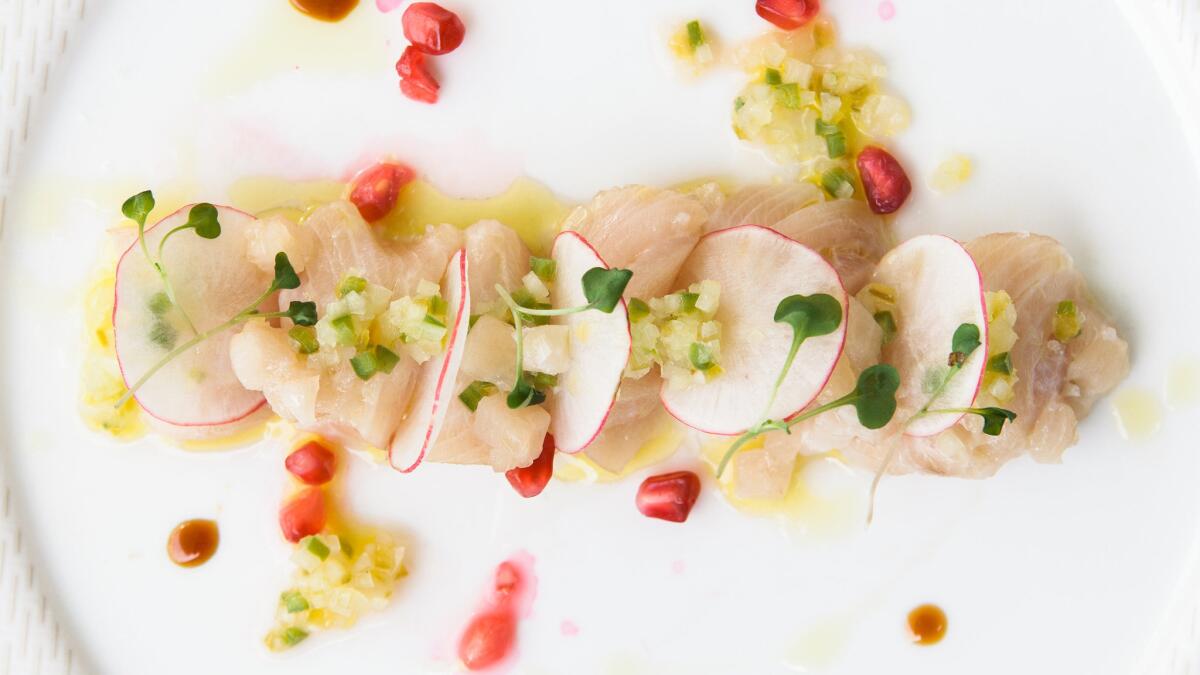 Yellowtail crudo is among the fish Herringbone receives fresh six days a week from the Honolulu Fish Co. The fish are line-caught in the waters off Oahu. (Hakkasan Group)