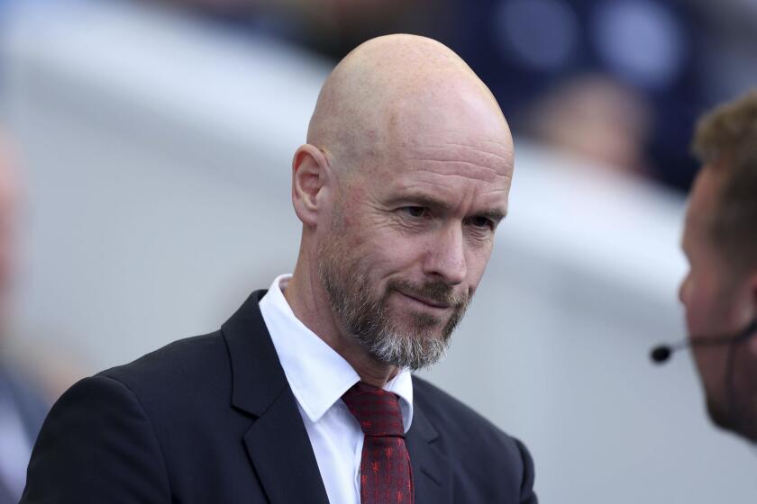 Manchester United manager Erik ten Hag smiles, ahead of the English Premier League soccer match between Brighton & Hove Albion and Manchester United, at the Amex Stadium, in Brighton and Hove, England, Sunday, May 19, 2024. (Steven Paston/PA via AP)