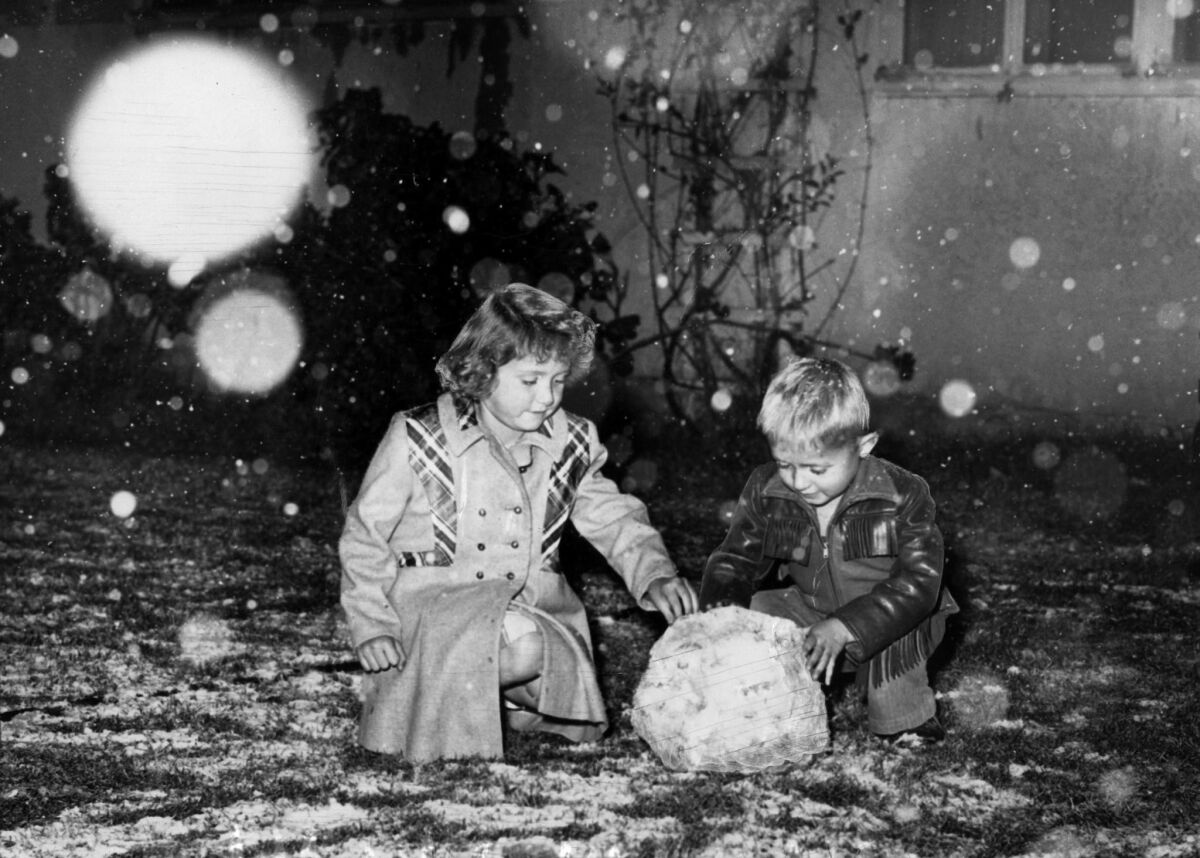 Jan. 10, 1949: Patricia and James Perkins of Riverside, like most members of a new generation, see snow for the first time.