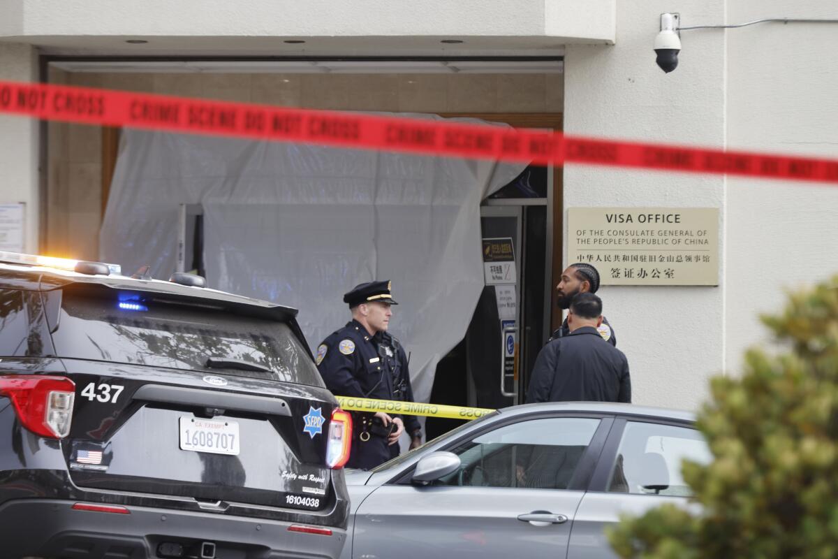 Police tape and emergency responders outside the Chinese Consulate in San Francisco