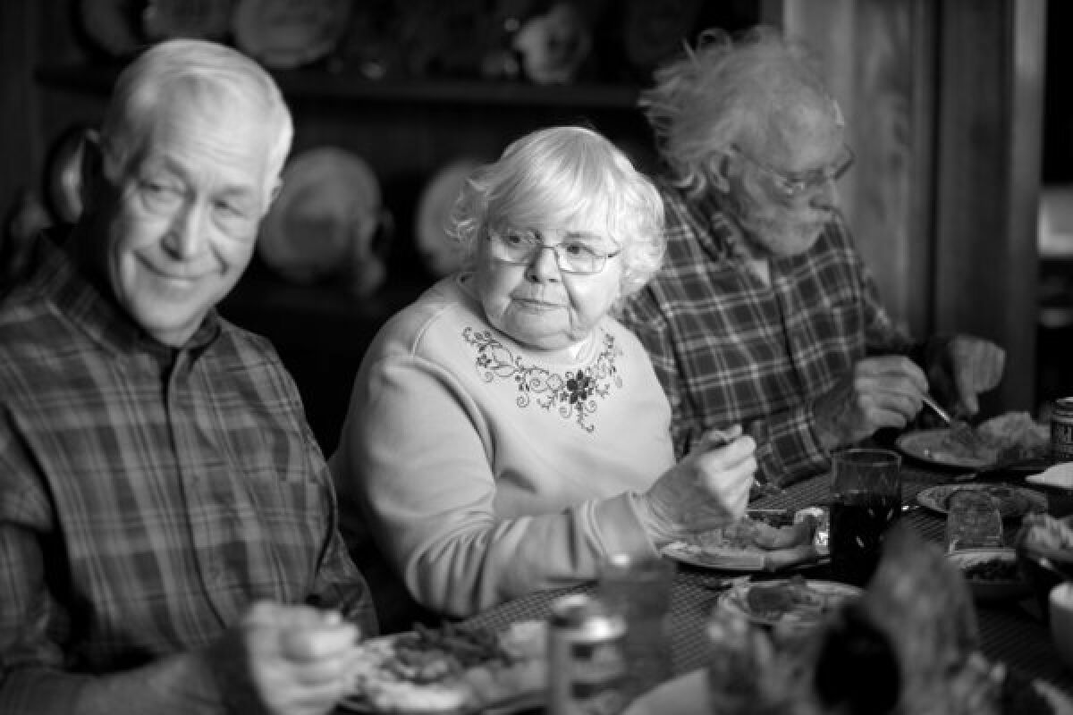 This image released by Paramount Pictures shows, from left, Dennis McCoig as Uncle Verne, June Squibb as Kate Grant and Bruce Dern as Woody Grant in a scene from the film "Nebraska, " about a booze-addled father who makes to Nebraska with his estranged son in order to claim a million dollar Mega Sweepstakes Marketing prize.