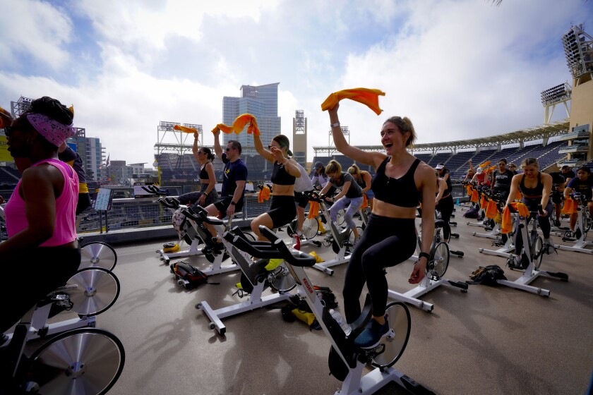 Participants taking part in a 50-minute spin workout for Padres Pedal the Cause.