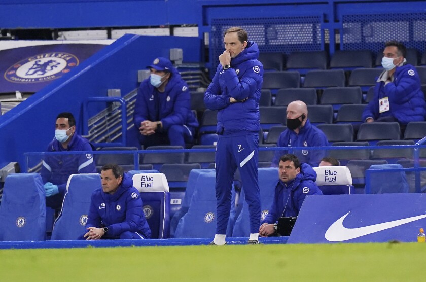 Chelsea's head coach Thomas Tuchel stands during the English Premier League soccer match between Chelsea and Arsenal at Stamford Bridge stadium in London, England, Wednesday, May 12, 2021. (Adam Davy, Pool via AP)