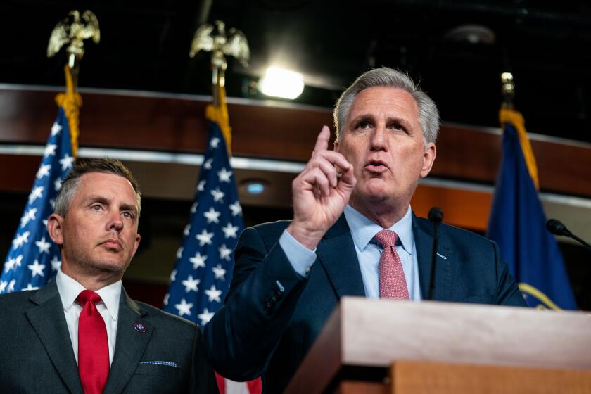 WASHINGTON, DC - JULY 21: House Minority Leader Kevin McCarthy (R-CA), flanked by fellow Republican House members speaks during a news conference on House Speaker Nancy Pelosi's decision to reject two of Leader McCarthy's selected members (Rep. Banks and Rep. Jordan) from serving on the committee investigating the January 6th insurrection, on Capitol Hill on Wednesday, July 21, 2021. McCarthy was joined by (L to R) Rep. Troy Nehls (R-TX), Rep. Kelly Armstrong (R-ND), Rep. Jim Banks (R-IN), Rep. Jim Jordan (R-OH) and Rep. Rodney Davis (R-IL). (Kent Nishimura / Los Angeles Times)