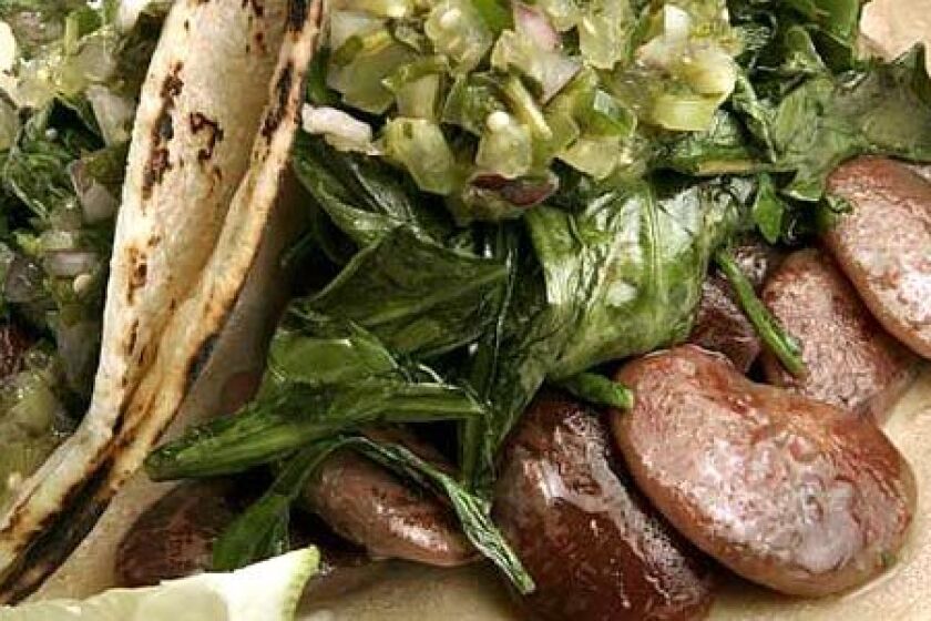 Recipe: Wilted dandelion greens and Christmas lima bean tacos.