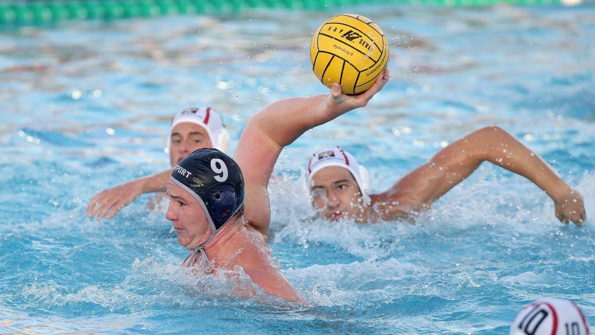 Junior center Ike Love, shown shooting against Harvard-Westlake on Oct. 5, is a key player for the Newport Harbor High boys' water polo team. The Sailors are the top seed in the CIF Southern Section Division 1 playoffs.
