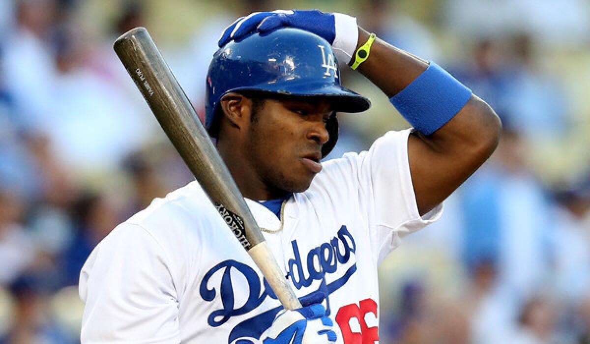 Dodgers rookie Yasiel Puig received a rousing ovation from the Dodger Stadium crowd during Sunday's game against the Colorado Rockies.