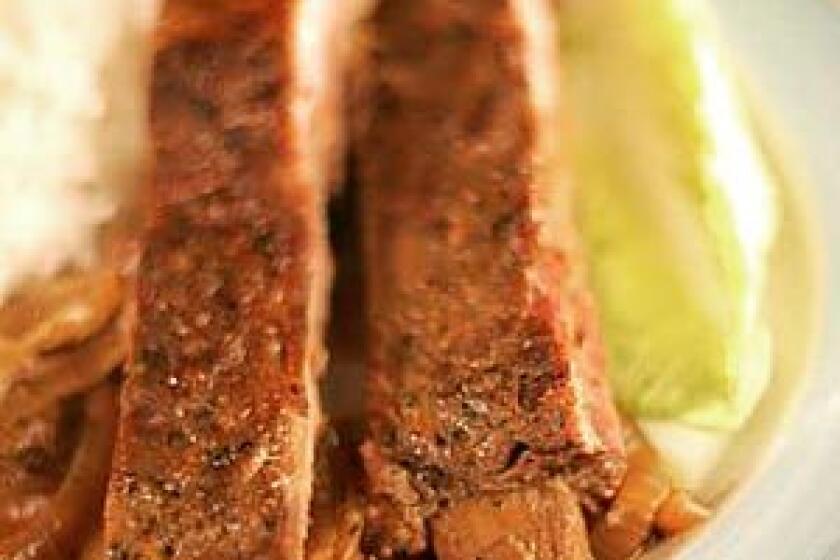 MESQUITE RUB: Ribs get their flavor not from being grilled over mesquite charcoal but from a perfumed mesquite-flour rub. Mesquite flour is in the marinade too, with orange and lime juices, rum, coconut and ginger.