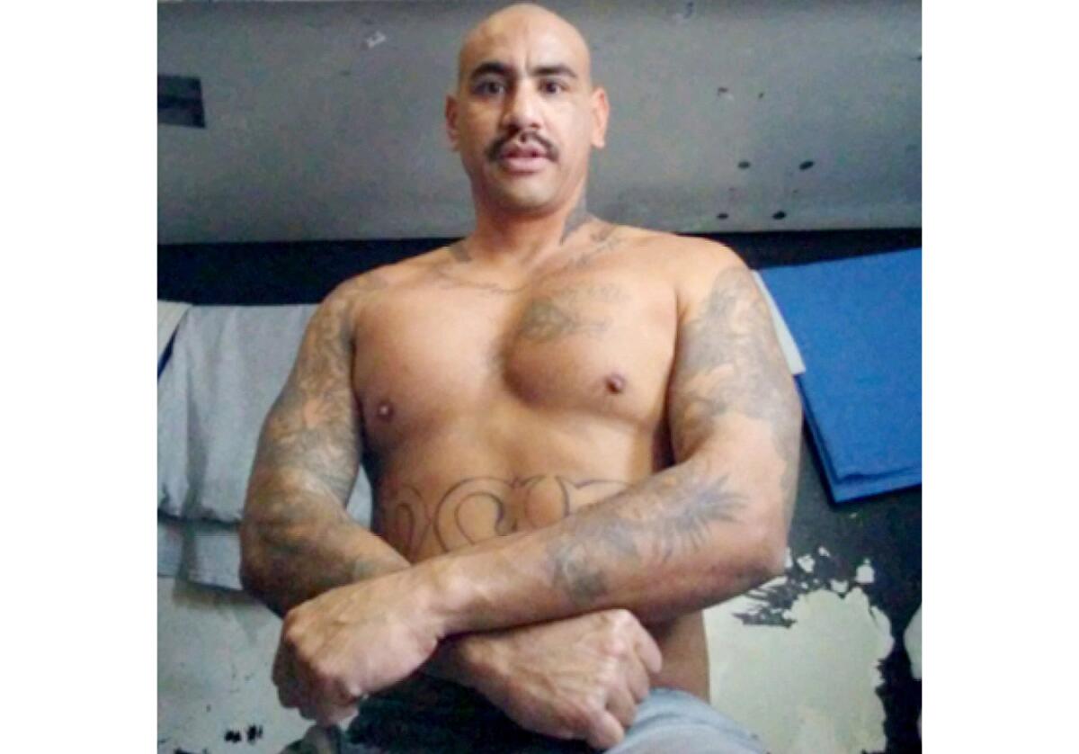 Ezequiel Romo in a prison cell