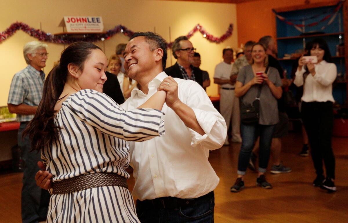 John Lee celebrates winning a City Council seat in August 2019