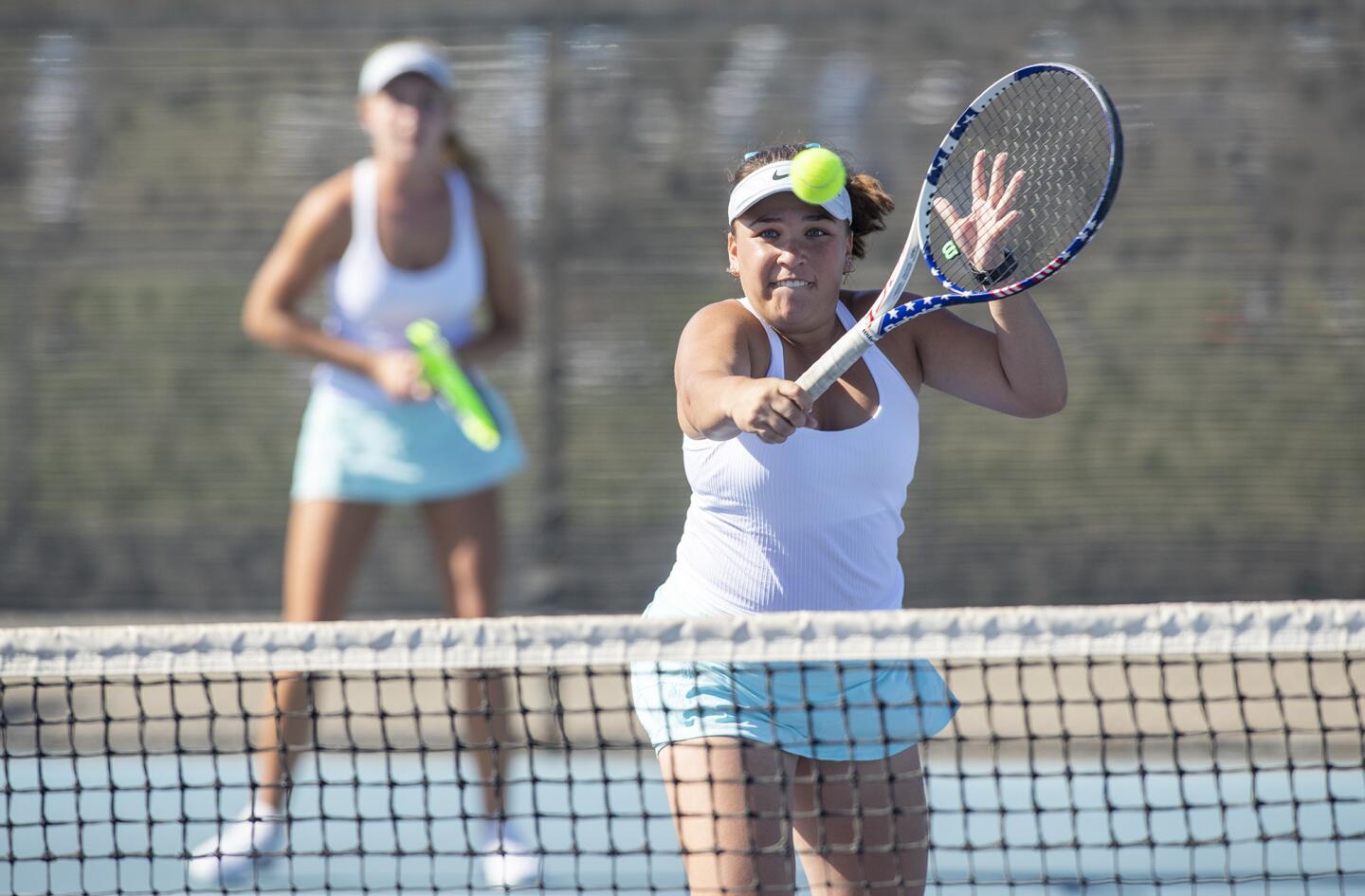 Corona del Mar's Dylan Matesky returns a shot during a doubles match with her partner Alden Mulroy against Palos Verdes in a nonleague match on Wednesday, September 12.