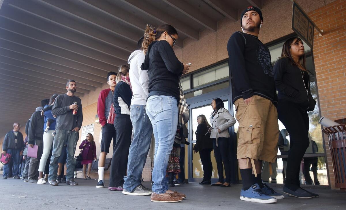 A line outside an Arizona Department of Transportation Motor Vehicle Division office in Phoenix.