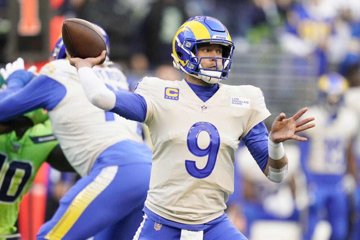 Rams quarterback Matthew Stafford throws against the Seattle Seahawks on Oct. 7, 2021.