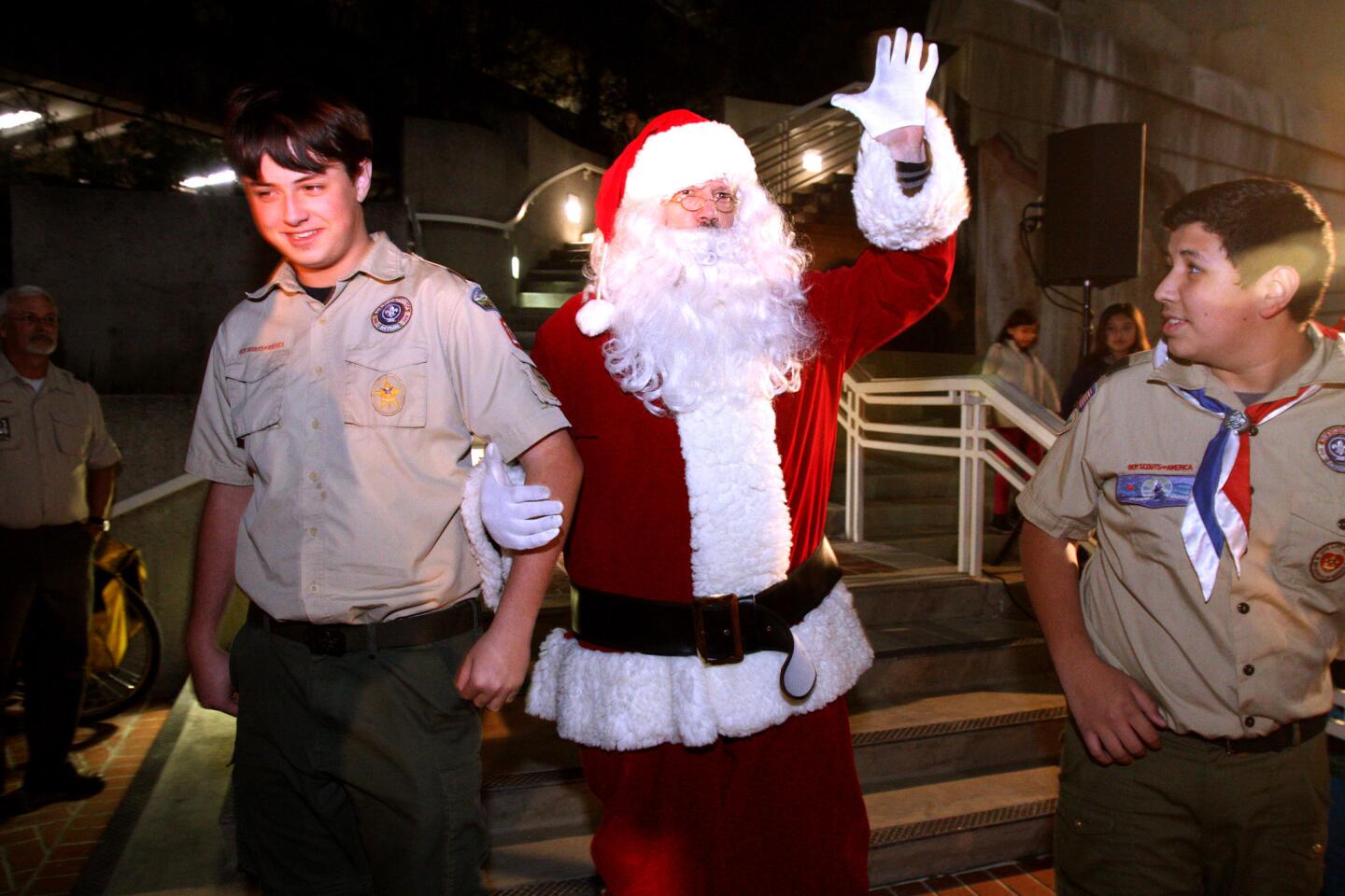 Santa Claus made an appearance after the tree lighting ceremony at Perkins Plaza in Glendale on Wednesday, Dec. 2, 2015.