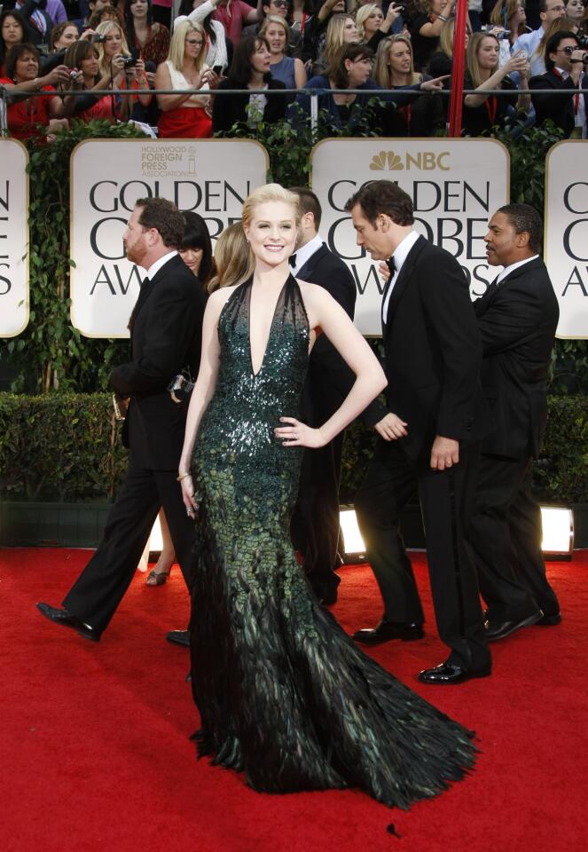 Evan Rachel Wood's midnight green Gucci gown, embroidered with fish scale sequins and ostrich feathers, is enchanting.
