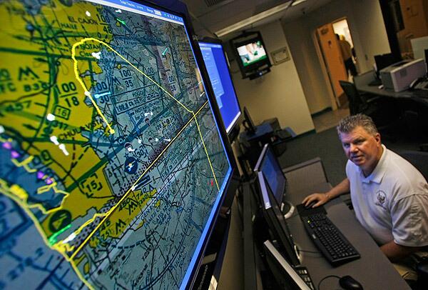 At Riverside County's Air and Marine Operations Center, a yellow line on the screen traces the route of an aircraft that crossed from Mexico into San Diego County. The center helps the U.S. Border Patrol detect drug smugglers who are flying ultralight aircraft across the border into California and Arizona. See full story