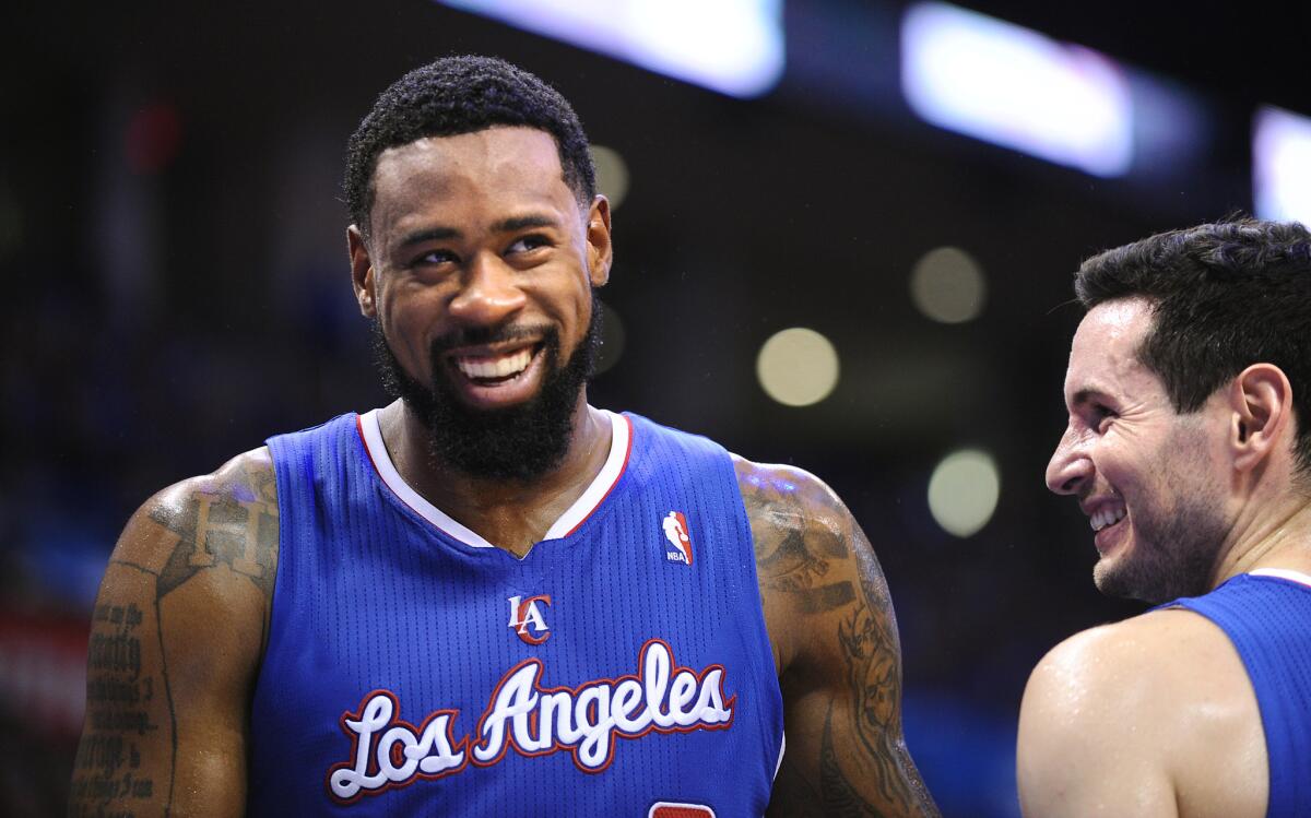 DeAndre Jordan, left, and J.J. Redick are happy with their new team owner.