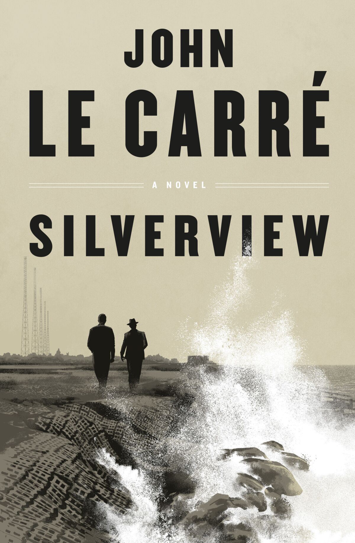 Two men walk along the coast on the cover of "Silverview," by John Le Carré.