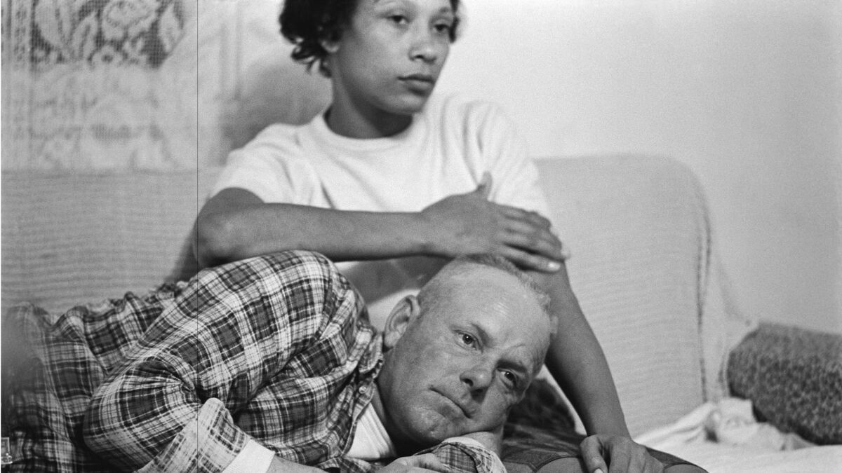 Detail of a Grey Villet photo from 1965 of Richard and Mildred Loving on their couch in Virginia.