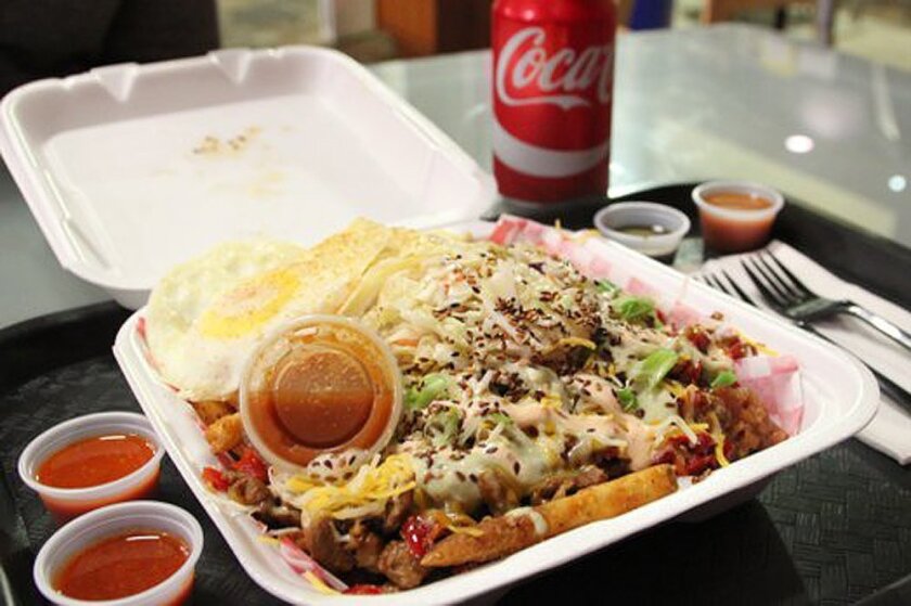 Tasty Mexican-Filipino fushion in a Styrofoam container so full, you won't be able to finish it all.