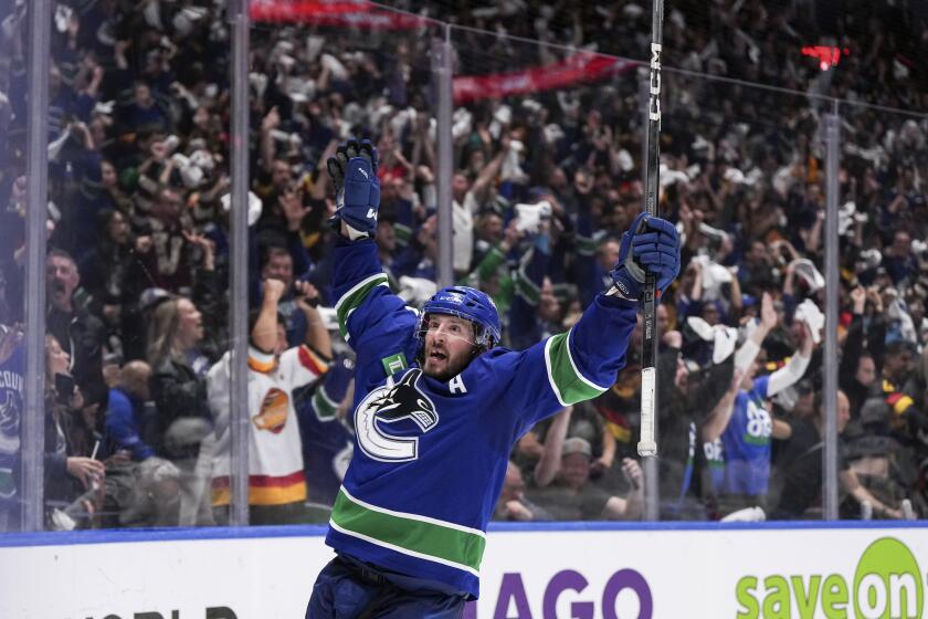 Vancouver Canucks' J.T. Miller celebrates his goal against the Edmonton Oilers during the third period of Game 5 of an NHL hockey Stanley Cup second-round playoff series, Thursday, May 16, 2024, in Vancouver, British Columbia. (Darryl Dyck/The Canadian Press via AP)