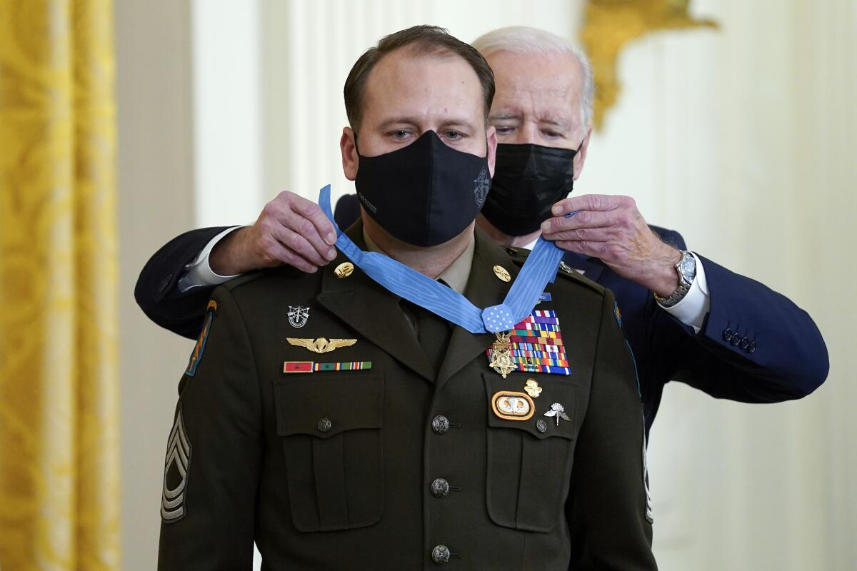 President Biden presents the Medal of Honor to Army Master Sgt. Earl Plumlee 