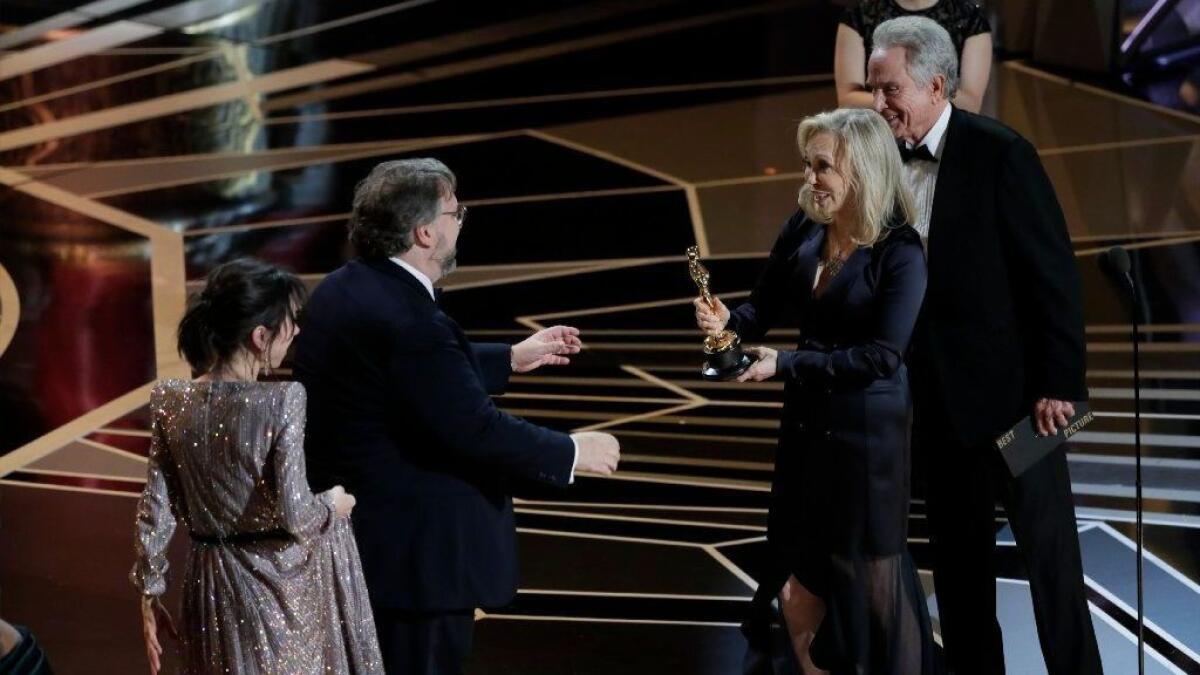 Faye Dunaway and Warren Beatty present the best picture Oscar to "Shape of Water" director and producer Guillermo del Toro.
