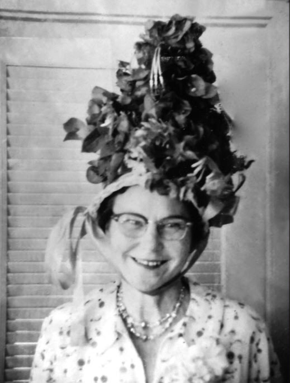 Mae Clarke wears her elaborate floral hat circa 1960.