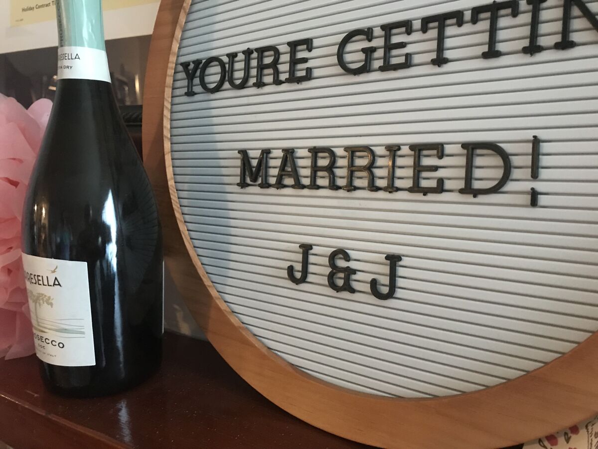 Her sister left this wedding congratulations on the mantel in my daughter's apartment.