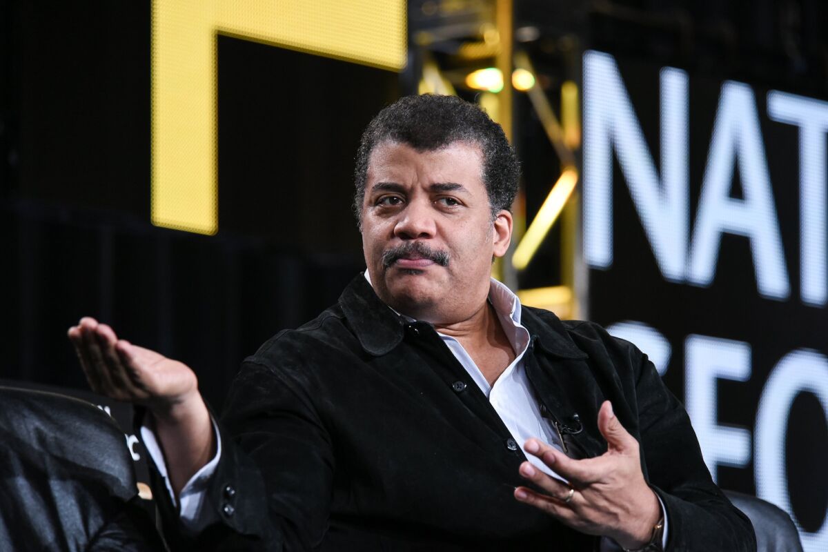 Astrophysicist Neil deGrasse Tyson discusses his upcoming National Geographic Channel show at the Television Critics Assn. press tour in Pasadena on Jan. 7.
