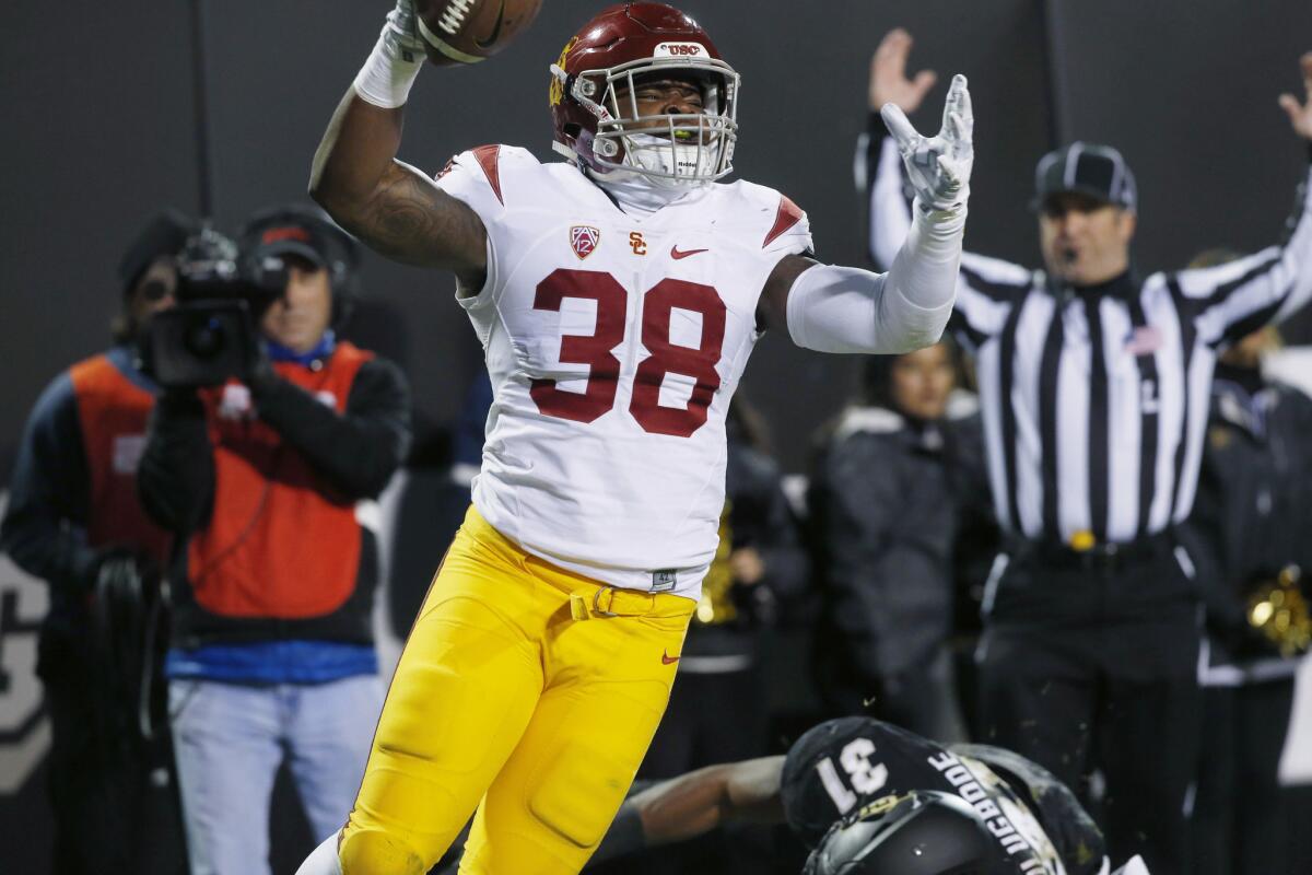 USC fullback Jahleel Pinner celebrates after catching a touchdown pass against Colorado.