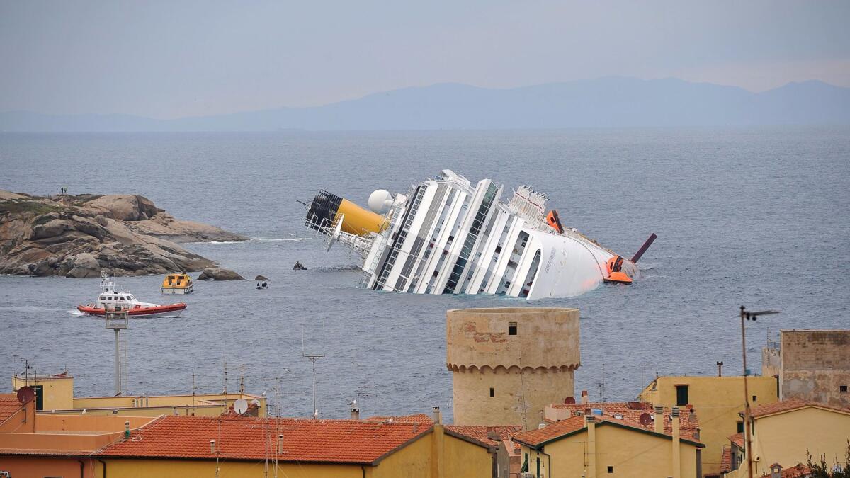 This file photo taken on Jan. 16, 2012, shows the wrecked cruise liner Costa Concordia in the harbor of the Tuscan island of Giglio after it ran aground after hitting underwater rocks.