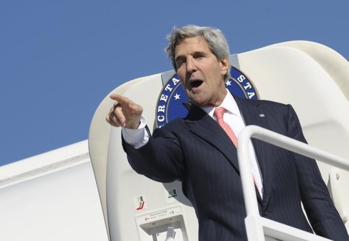 U.S. Secretary of State John Kerry boarding his plane at Vilnius International Airport in Vilnius, Lithuania, on Saturday. Kerry sought to muster European Union support for military strikes against Syria.