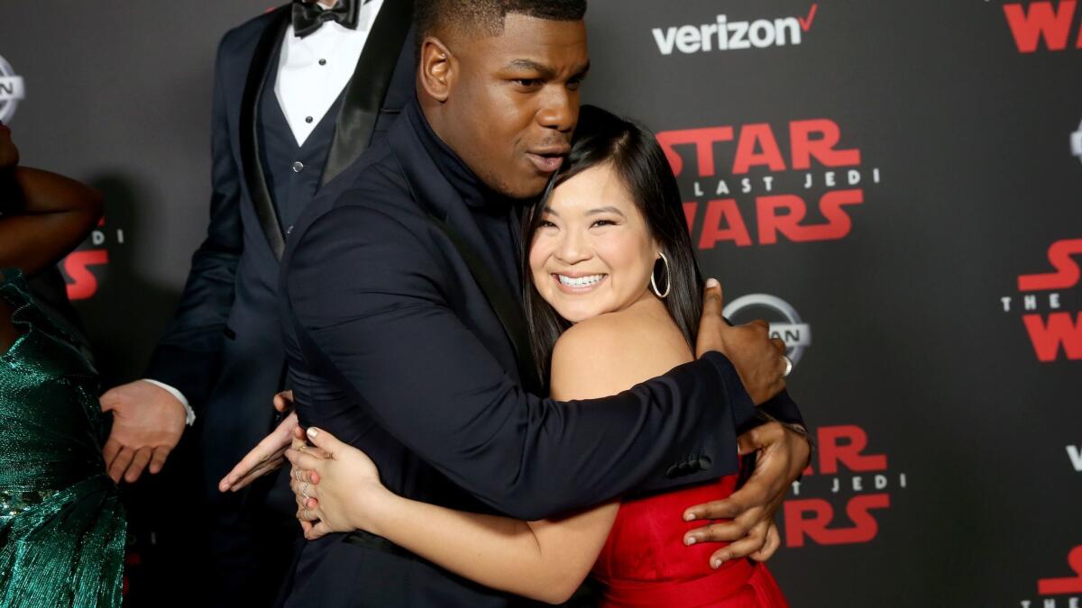 John Boyega and Kelly Marie Tran celebrate at the Los Angeles premiere of "Star Wars: The Last Jedi."