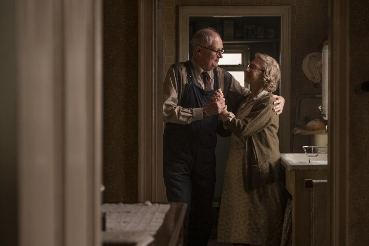 This image released by Sony Pictures Classics shows Jim Broadbent, left, and Helen Mirren in a scene from "The Duke." (Nick Wall/Sony Pictures Classics via AP)