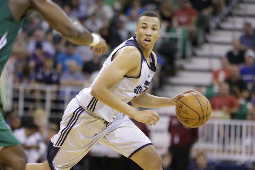 Utah Jazz guard Dante Exum brings the ball up the court during a summer league game against the Boston Celtics on July 6.