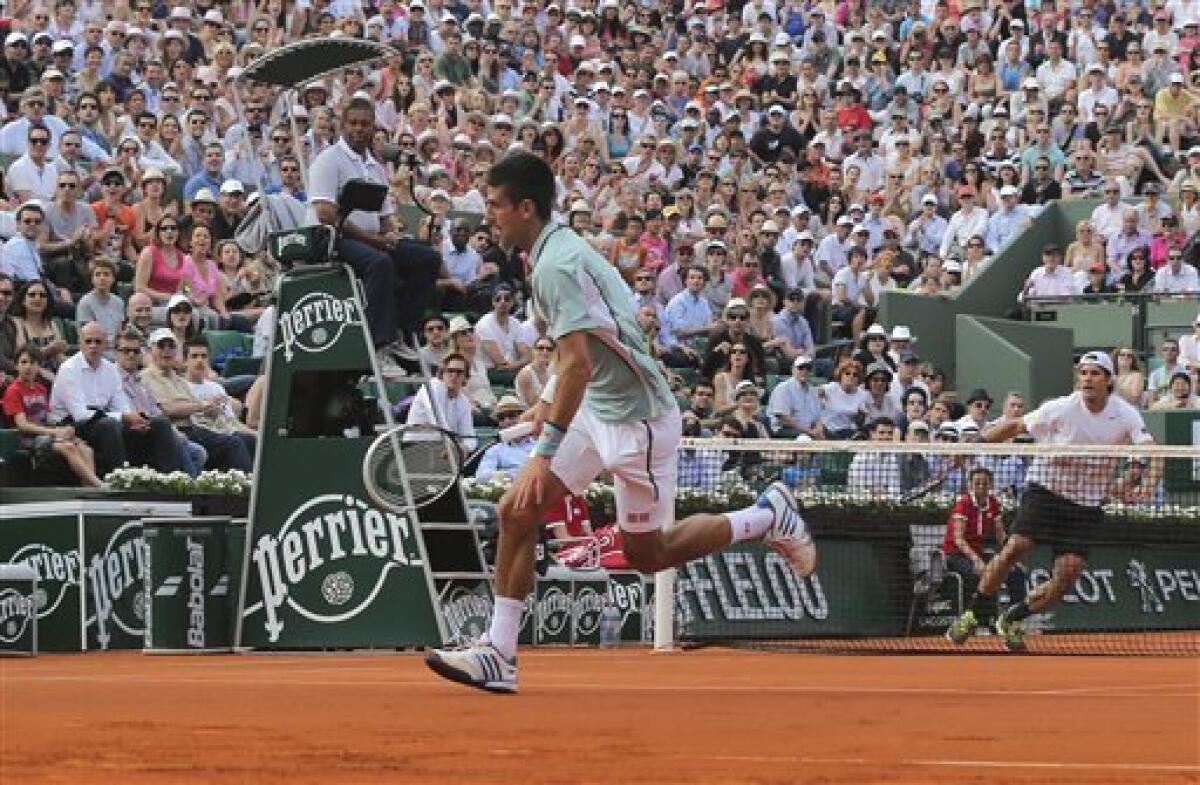 Nadal, Djokovic, Sharapova advance at French Open