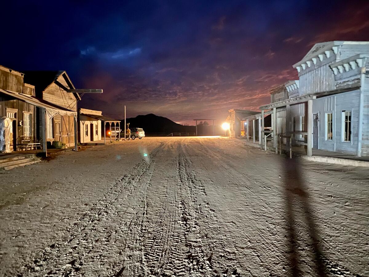 A western set at night.